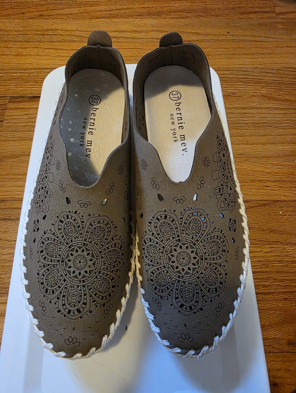 bernie mev. Taupe Laser-Cut Floral Slip-Ons with White Braided Trim